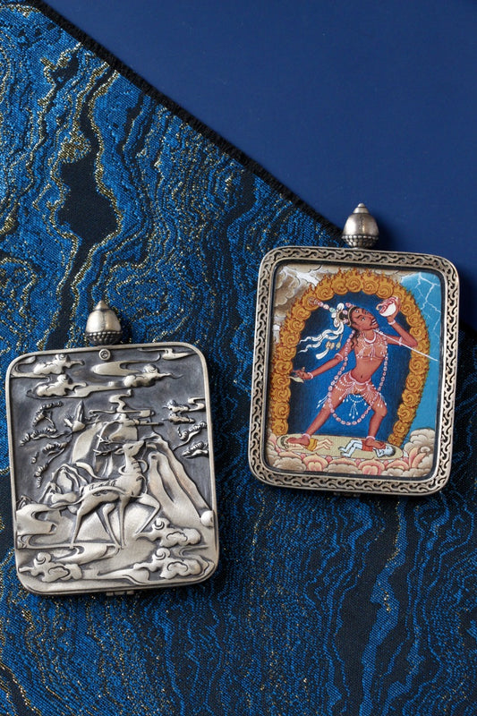 Narodakini thangka pendant depicting the Vajrayana dakini of wisdom and transformation in Tibetan Buddhism.