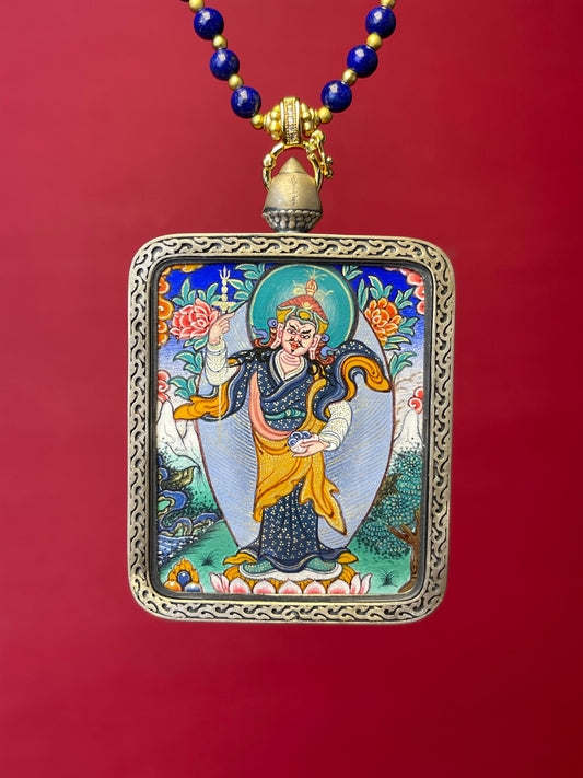 Detailed view of the copper casing for the Padmasambhava Standing Thangka pendant, symbolising the Guru and tradition in Buddhist practice.