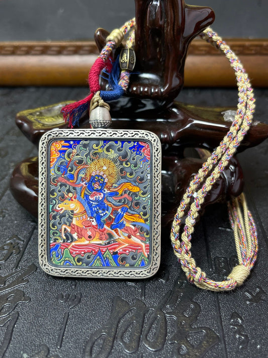 Close-up detail of the Rekong Palden Lhamo Thangka showing mineral pigments gold cinnabar lapis agate turquoise, Rekong series artistry.