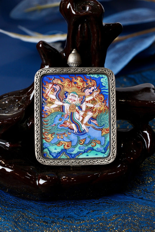 Pehar Gyalpo thangka pendant depicting the Tibetan Buddhist protector deity, symbolizing protection, authority, and spiritual guardianship