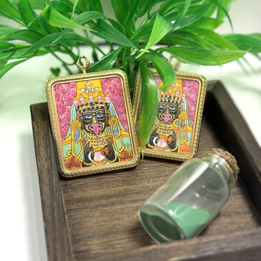 The Nepal Pink Zhagilamu Thangka pendant displayed as a sacred amulet for wealth and wishes fulfilled, embodying Tibetan Buddhist tradition.