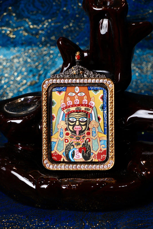 A hand-painted Rebgong Palden Lhamo Thangka pendant featuring the fierce protector goddess of wealth, encased in exclusive 925 Sterling Silver, representing the sacred guardian of prosperity and protection in Tibetan Buddhist culture.