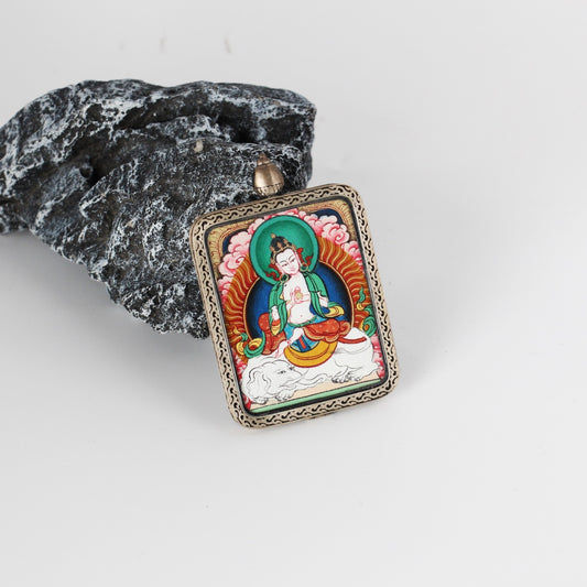A 2.5x3.5cm hand-painted Karma Kagyu Samantabhadra Bodhisattva Thangka pendant featuring the Bodhisattva of Universal Virtue, encased in titanium steel, representing virtue in Tibetan Buddhist tradition.