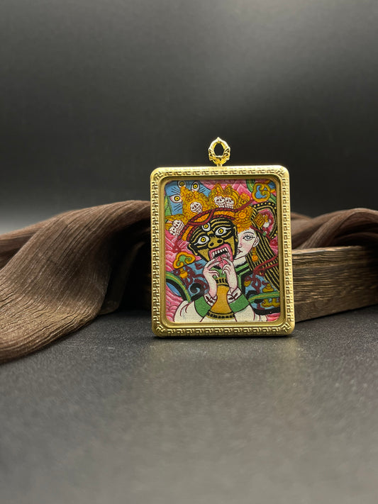 Detailed view of the titanium casing for the Shachilama Pink Past and Present Thangka pendant, symbolising unyielding courage and tradition in Buddhist practice.