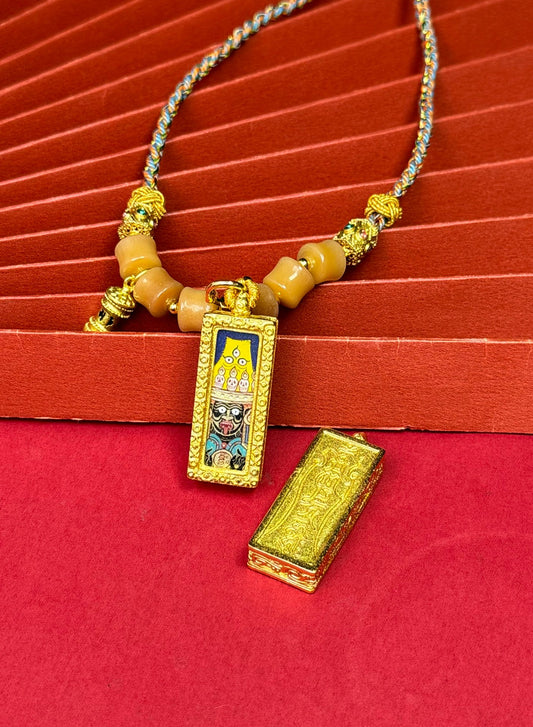 Hand-painted Rekong Shachilama (扎基拉姆) Thangka pendant 1x3 inch with copper casing featuring the guardian deity of Tibet and female wealth deity, representing protect and bless the world in Buddhist tradition.
