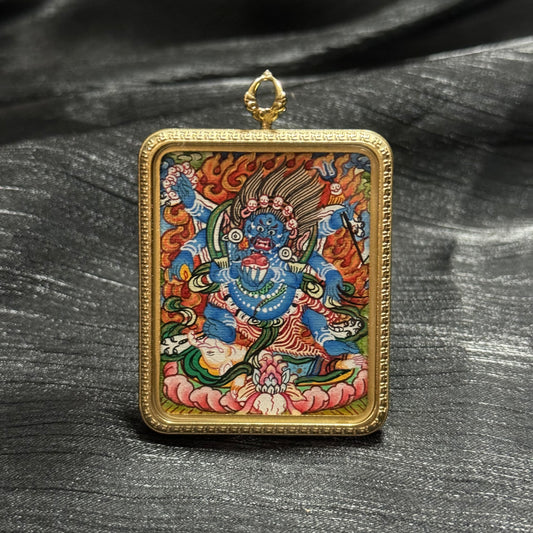 The Nepal Six-Armed Mahakala Thangka pendant displayed as a sacred amulet for protection and wealth, embodying Buddhist tradition.