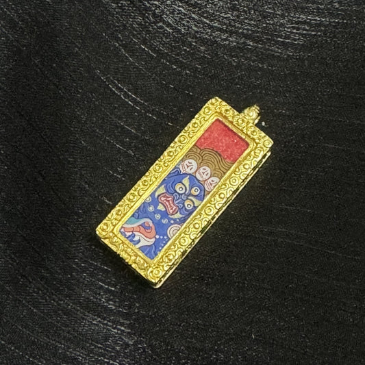 Hand-painted Rebgong Buddha Head Six-Armed Mahakala Thangka pendant featuring the great protector, encased in copper, representing pacification and prosperity in Tibetan Buddhist tradition.