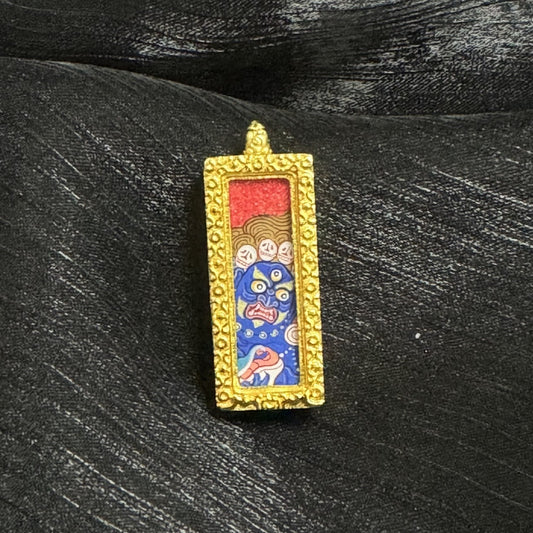 Detailed view of the copper casing for the Six-Armed Mahakala Thangka pendant, symbolizing protection and elegance in Tibetan Buddhist tradition.
