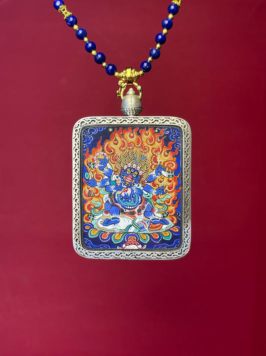 Close-up detail of the Rekong Six-Armed Mahakala Thangka showing mineral pigments and gold, showcasing Rekong series artistry.