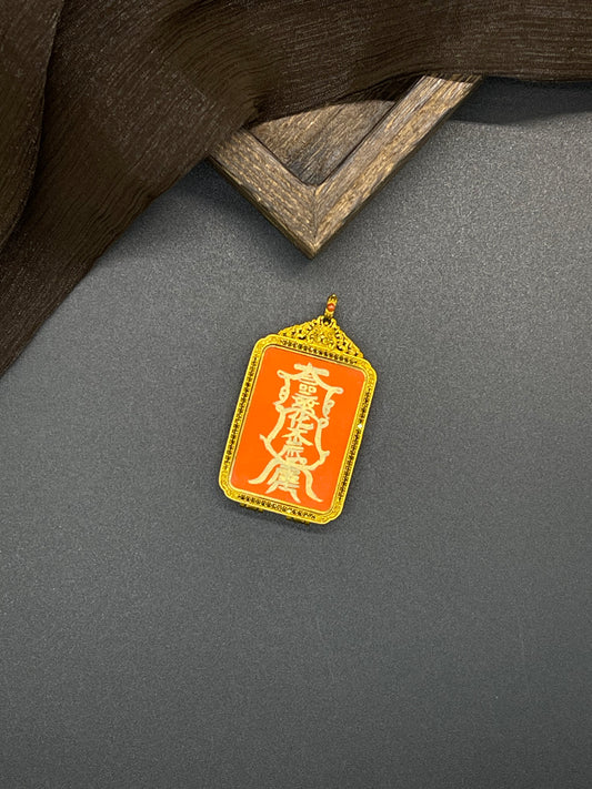 Hand-painted Rekong Tai Sui Talisman (太岁符) 2.5x3.5cm with cinnabar base and gold pigment, copper casing, representing warding off evil and auspicious fortune in Buddhist tradition.