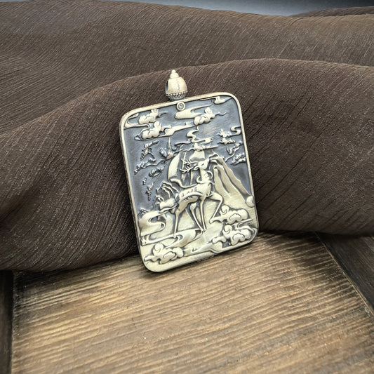 A 3.5x4.5cm hand-painted Rekong Vairocana (大日如来) Thangka pendant with 925 silver featuring the Buddha of light and wisdom, representing illumination and success in Buddhist tradition.