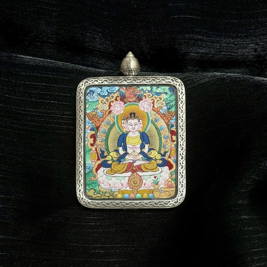 Close-up detail of the Menri Vairochana Thangka painting showing intricate natural mineral pigment work and symbolic hand gestures, showcasing the artistry of Tibetan lineage painters.