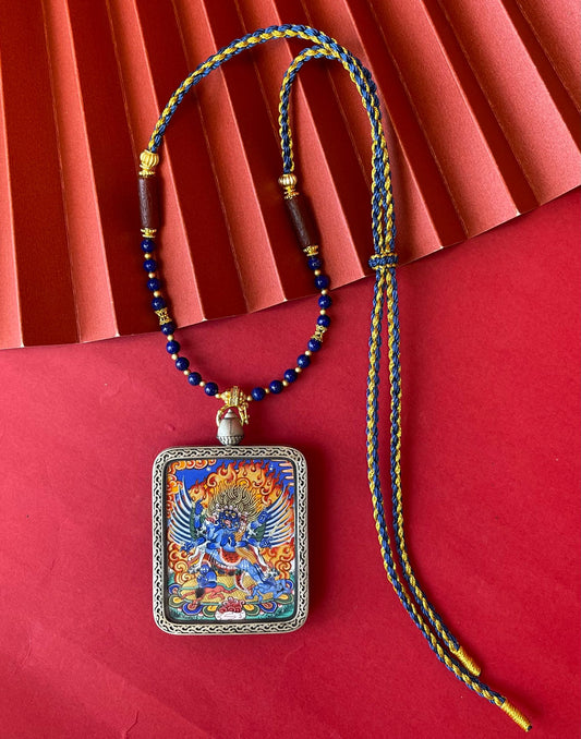 Close-up detail of the Tibet Vajrakilaya Thangka showing mineral pigments, showcasing Tibet series artistry.