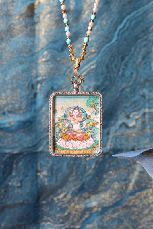 A 3.5x4.5cm hand-painted Tibetan Buddhist Vajrasattva Thangka pendant featuring the Bodhisattva of Purification, encased in exclusive 925 Sterling Silver, representing the purifier of all karma and defilements in Tibetan Buddhist culture.