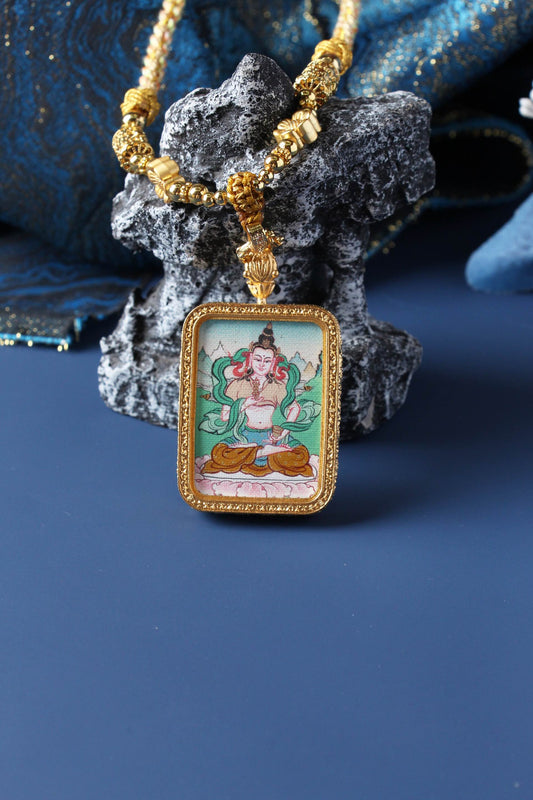 A 3.5x4.5cm hand-painted Tibetan Buddhist Vajrasattva Thangka pendant featuring the Bodhisattva of Purification, encased in exclusive 925 Sterling Silver, representing karma purification in Tibetan Buddhist culture.