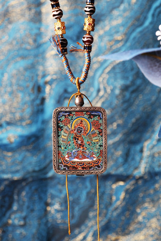 A 3.5x4.5cm hand-painted Tibetan Buddhist Vajrasattva Thangka pendant featuring the Bodhisattva of Purification, encased in exclusive 925 Sterling Silver, representing the purifier of all karma and defilements in Tibetan Buddhist culture.