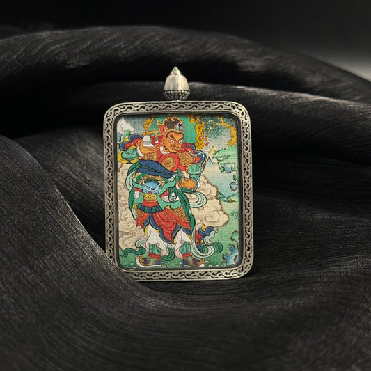 Detailed view of the presentation and casing for the Virupaksha Cuiying Thangka pendant.