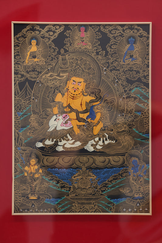 A Tibetan Buddhist Jambhala mandala thangka, displaying the deity's form for offering and prosperity.
