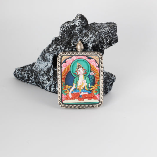 Close-up detail of the Rebgong White Tara Thangka painting showing intricate natural mineral pigment work, showcasing the masterful artistry of Tibetan lineage painters.