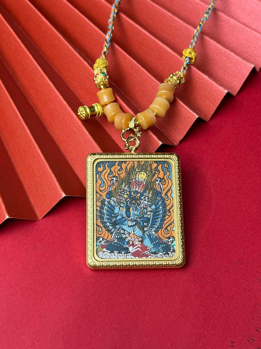 Hand-painted Nepal Yamantaka (大威德金刚) Thangka pendant 4x5cm with hand-designed cord featuring the wrathful form of Manjushri, representing the removal of obstacles and accomplishment of endeavours in Buddhist tradition.