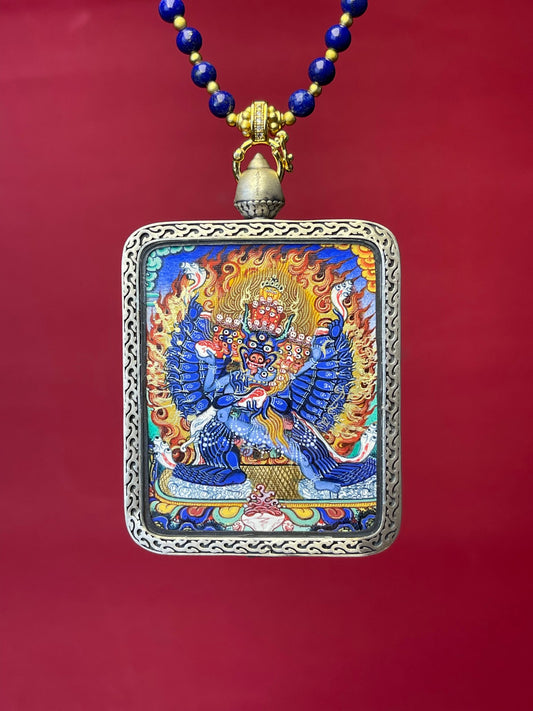 Detailed view of the copper casing for the Yamantaka Thangka pendant, symbolising conquerer of death and tradition in Buddhist practice.