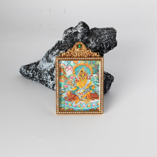 Detailed view of the titanium steel casing for the Yellow Jambhala Thangka pendant, symbolizing protection and elegance in Tibetan Buddhist tradition.