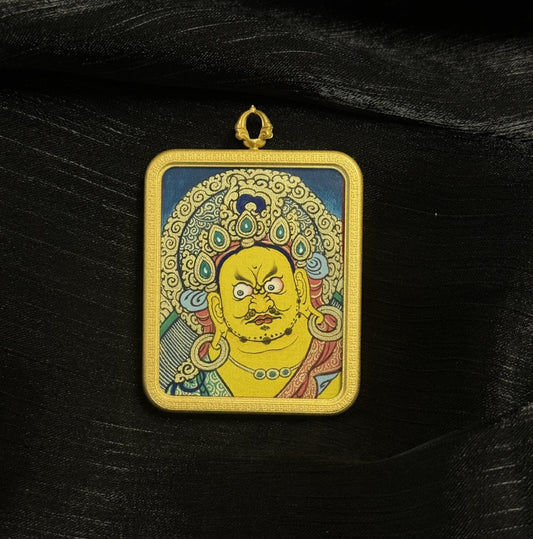Detailed view of the protective casing for the Yellow Jambhala Thangka pendant, symbolising protection and tradition in Buddhist practice.