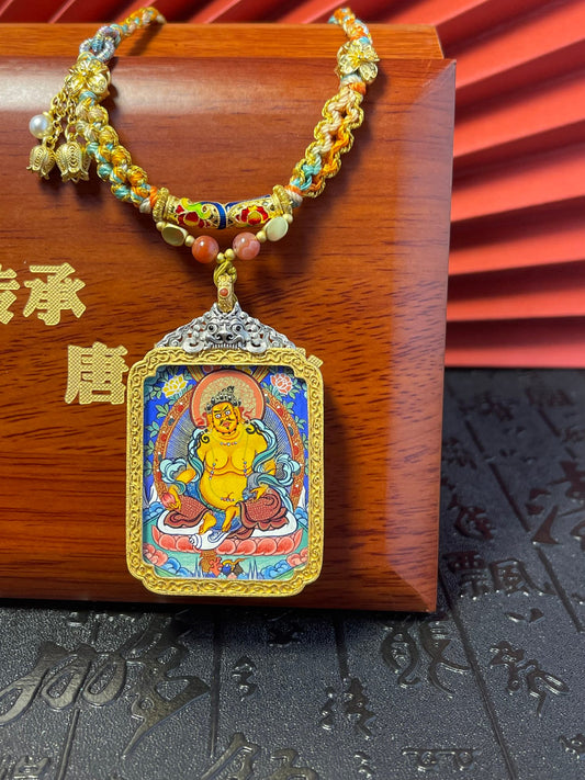 Hand-woven cord and 3.5x4.5cm Yellow Jambhala Rekong pendant, Rekong series.