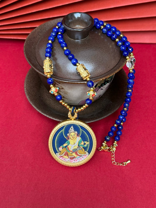 Hand-painted Tibet Bold Yellow Jambhala (黄财神) Thangka pendant 3.5cm with copper casing featuring the king of wealth deities, representing prosperity in Buddhist tradition.