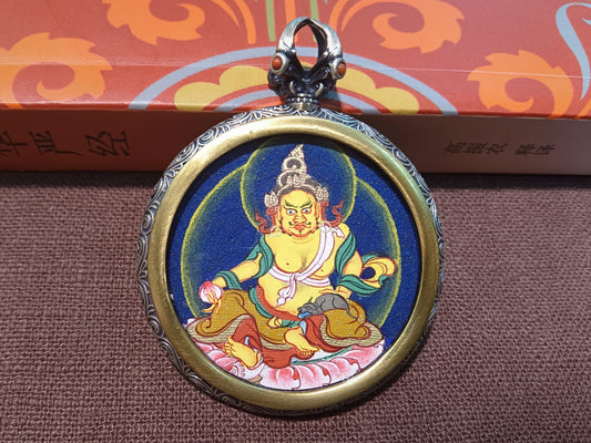 925 silver casing for the Yellow Jambhala 3.5cm Tibet Card pendant, symbolising wealth and tradition in Buddhist practice.