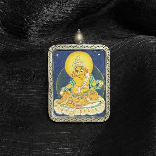 Detailed view of the Dunhuang Nine-Colour Deer silver casing for the Yellow Jambhala Thangka pendant, symbolizing protection and elegance in Tibetan Buddhist tradition.