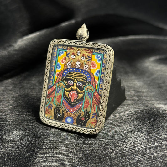 A 3.5x4.5cm hand-painted Rekong Zaki Lhamo Gold Relief Thangka pendant with 925 silver casing, featuring the female wealth deity and raised gold artistry.