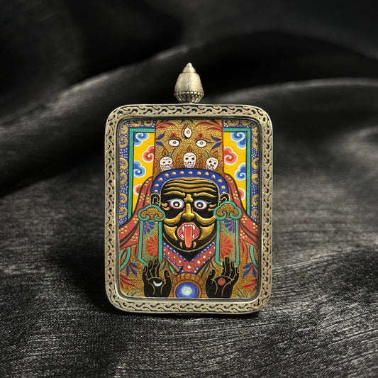 Close-up detail of the Rekong Zaki Lhamo Gold Relief Thangka painting showing multi-layer gold relief and natural mineral pigments.