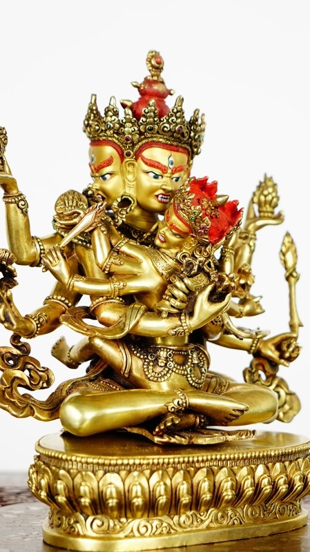 Handcrafted Tibetan Buddhist Diamond Vajra statue, featuring gilded craftsmanship and mineral pigments, showcasing the essence of Buddhist art.