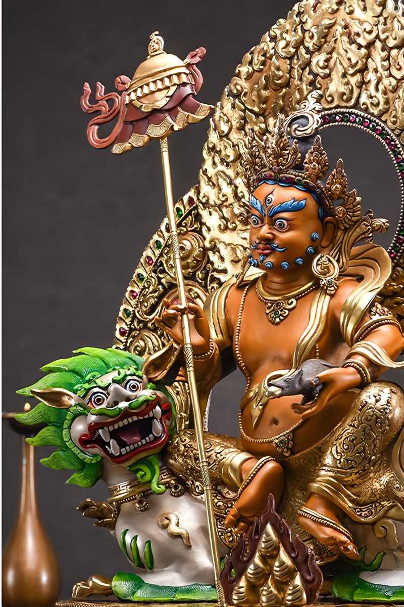 Tibetan Buddhist Dzambhala wealth deity statue, handmade from copper with mineral pigments, representing wealth and spiritual generosity.
