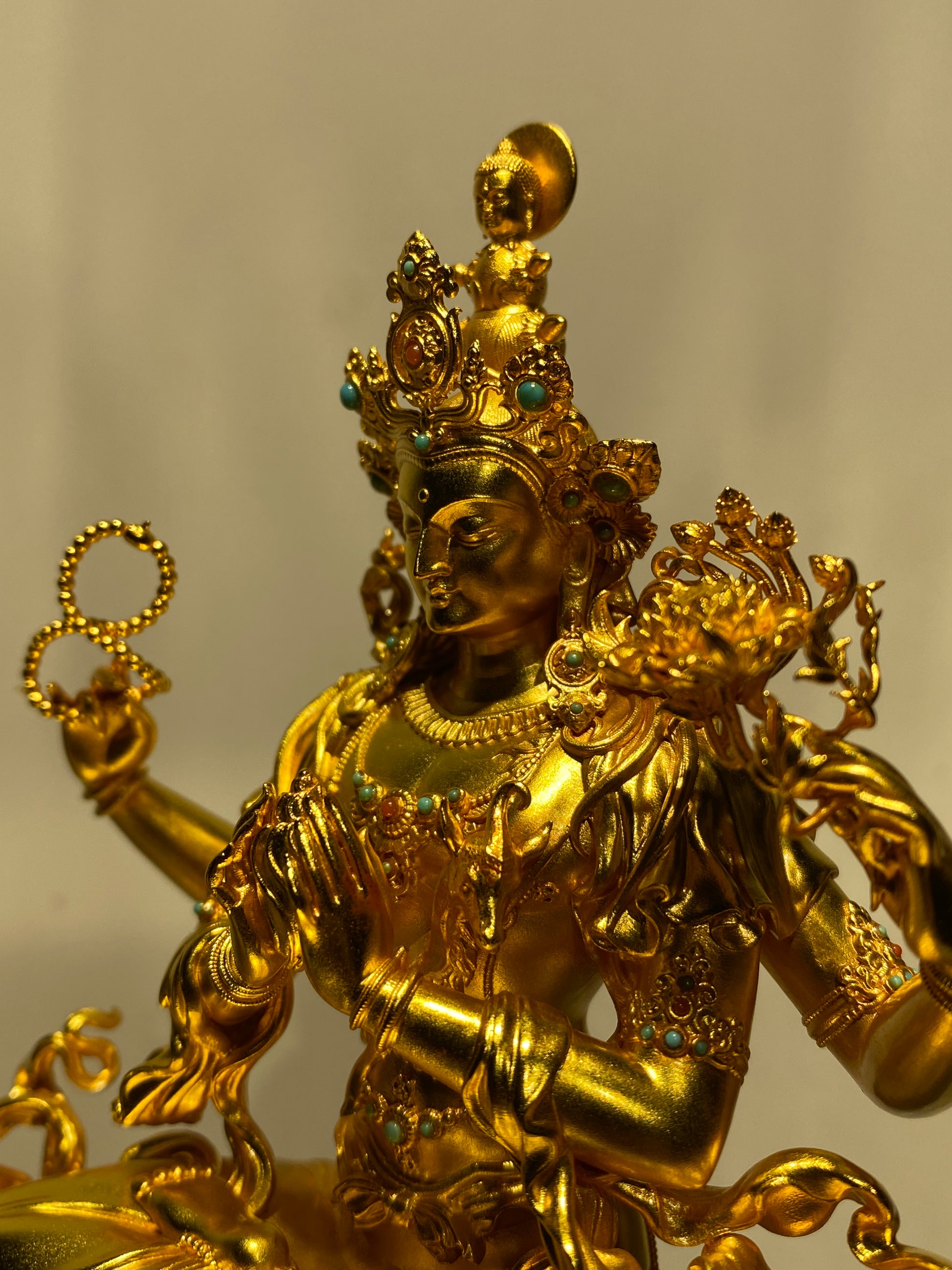 Tibetan-buddhist Vajrapani Bodhisattva statue, silver-gilded and hand-painted, fine detail in Tibetan Buddha art.