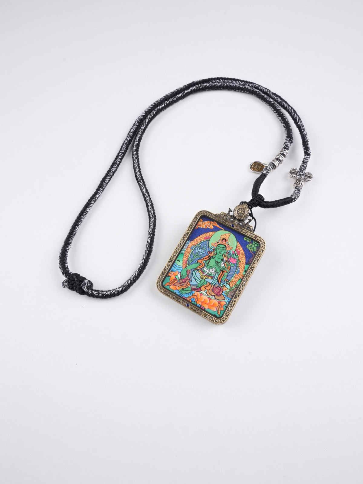 “Small Tibetan thangka hanging of Green Tara, zodiac guardian pendant for twelve animals, handcrafted Buddhist art with sacred details.”