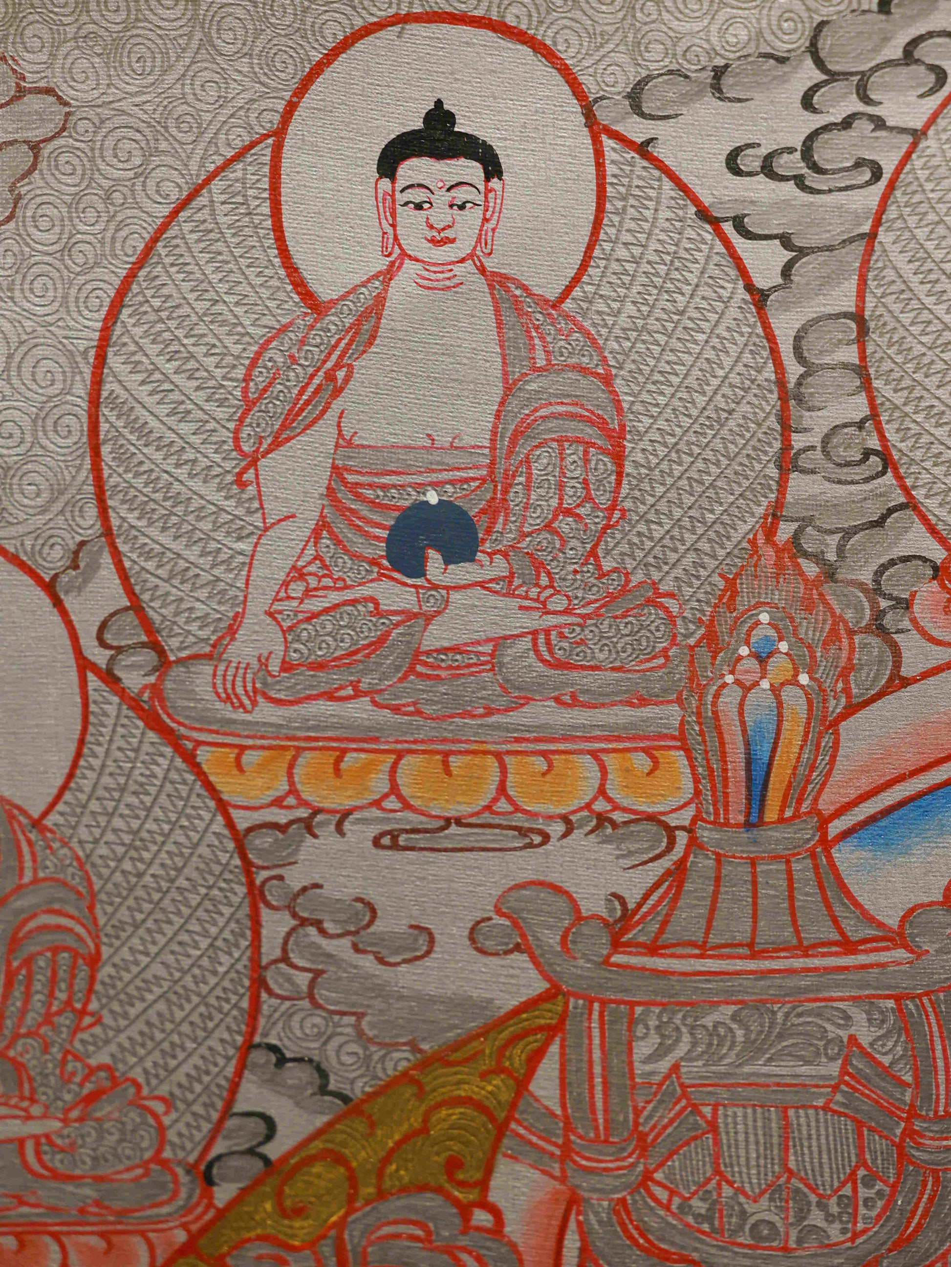 Handcrafted Silver Foil Tibetan Thangka – Yellow Dzambhala, deity of wealth and compassion.