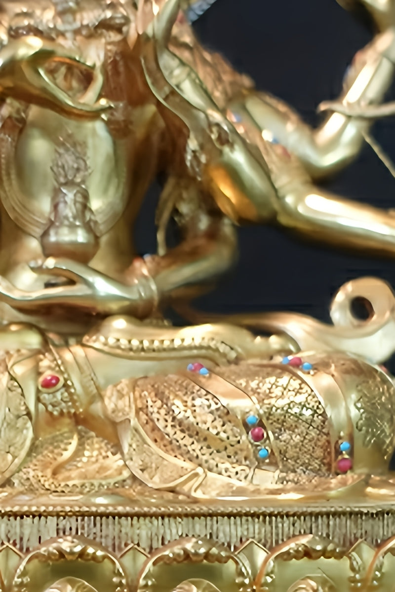 Handcrafted brass painted Ushnisha Vijaya Buddha statue, Tibetan Buddhist art symbolizing wisdom, health, and protection from obstacles.