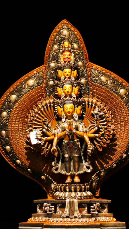 Handcrafted Tibetan-Buddhist Thousand-Arm Avalokiteshvara Buddha Statue, made of purple copper and painted by hand, embodying compassion and wisdom in Buddhist art.