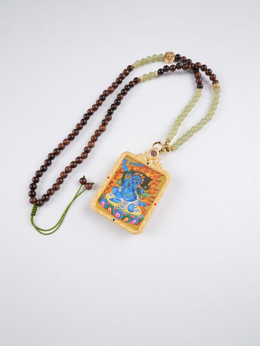 Hand-painted Vajrapani Bodhisattva Thangka pendant on traditional Tibetan canvas for protection and power.
