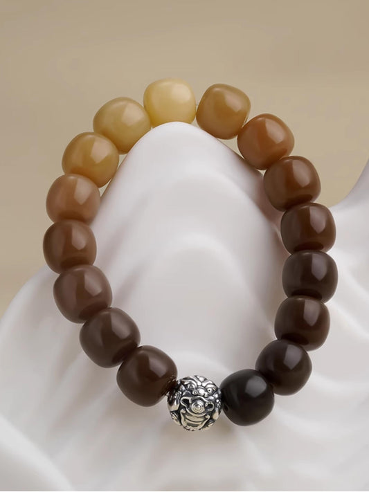 Handmade Tibetan Buddhist bodhi mala Rock Shadow Flow featuring natural bodhi seeds and sterling silver mouse spacer bead