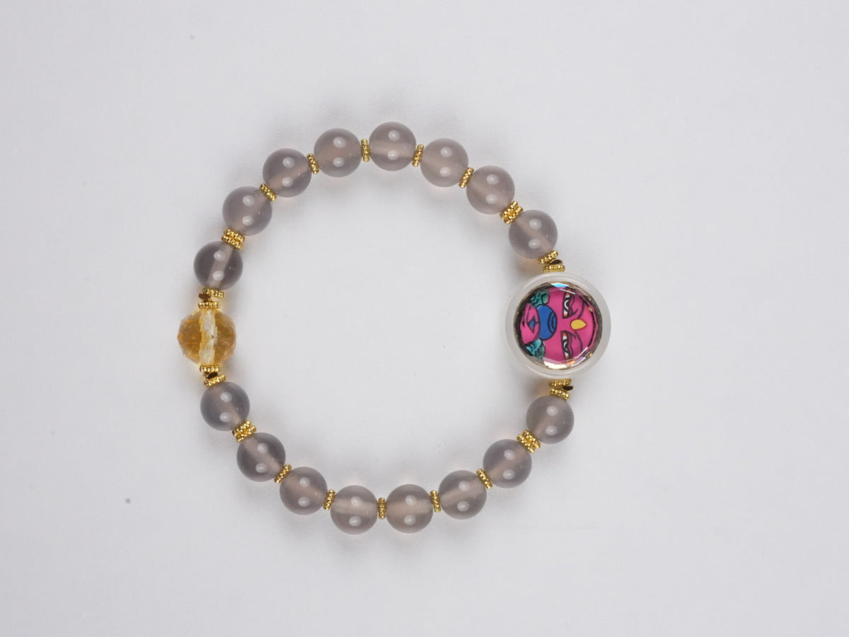 Hand-painted Tibetan Buddhist Hayagriva mini thangka bracelet on canvas, crafted with mineral pigments, symbolizing powerful protection and spiritual strength in Buddha art.