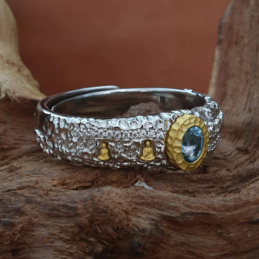 Hand-painted silver Buddha Cave ring inspired by Tibetan Buddhist Jewelry Culture, a unique jewelry art piece symbolizing spiritual protection and wisdom.