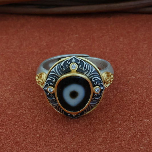 Hand-carved silver One-Eye Bead ring from Tibetan Buddhist Jewelry Culture, showcasing exquisite jewelry art and meticulous handcraft.