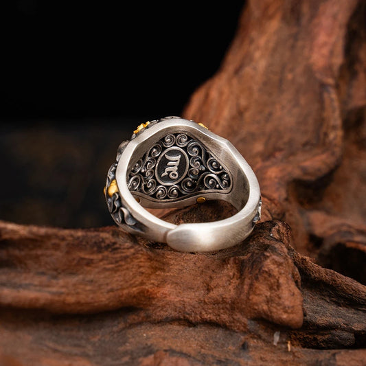 Hand-painted silver Treasure Mouse ring inspired by Tibetan Buddhist Jewelry Culture, a unique jewelry art piece representing prosperity and good fortune.