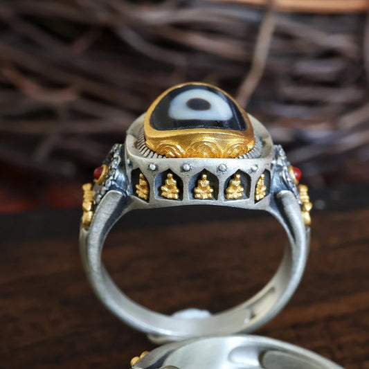 Hand-painted silver One-Eyed Formless Buddha ring inspired by Tibetan Buddhist Jewelry Culture, a unique jewelry art piece symbolizing spiritual clarity.