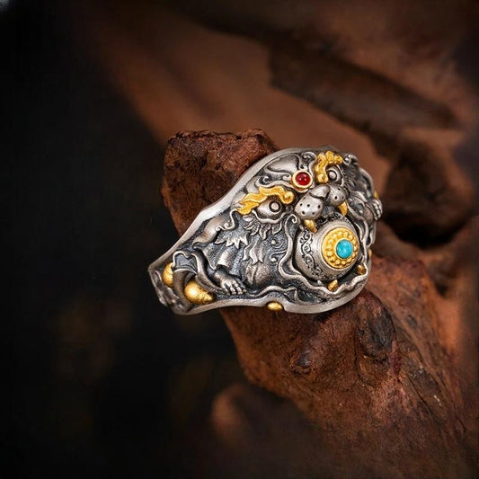 Hand-carved silver Treasure Mouse ring from Tibetan Buddhist Jewelry Culture, symbolizing wealth, luck, and fortune in exquisite jewelry art.