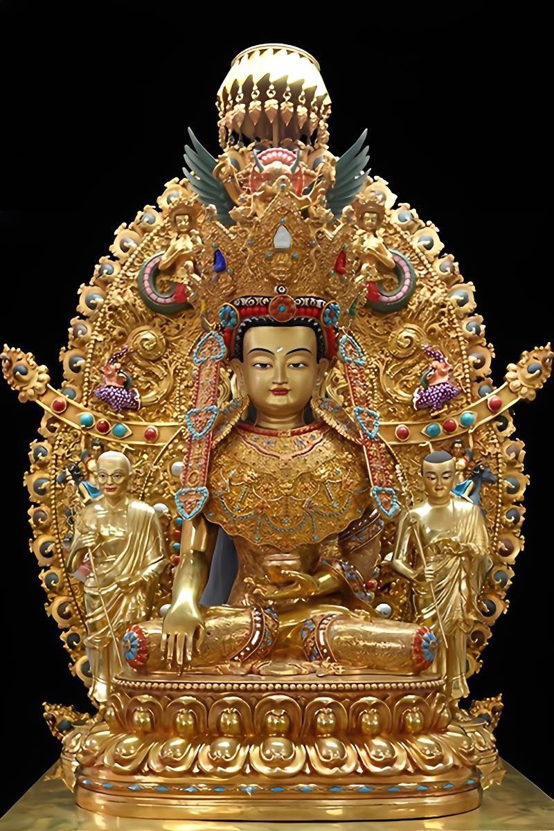 True golden gilded Jowo Buddha statue in brass, Tibetan Buddhist sacred art representing compassion, prosperity, and enlightenment.