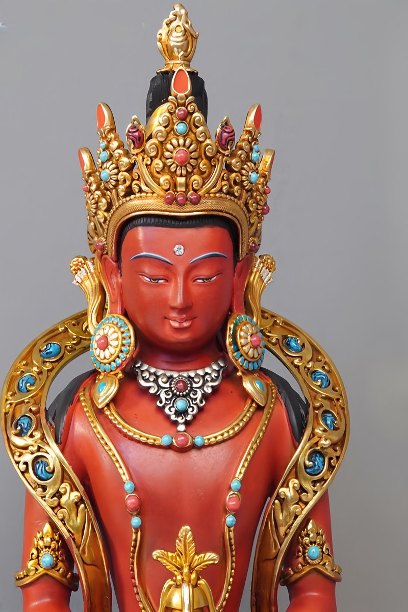 Handcrafted brass Long Life Buddha statue with gilded details and mineral pigment artwork, showcasing Tibetan Buddhist craftsmanship.